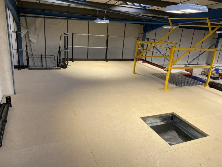 Storage Mezzanine with a Partitioned Storeroom